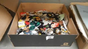 A large box of assorted vintage buttons.