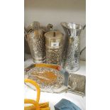 A mixed lot of silver plate including gravy boat, spills, box etc.