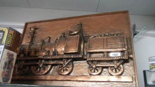A large old plastic train plaque