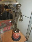 A bronze figure of a dancing lady signed D H Chiparus.
