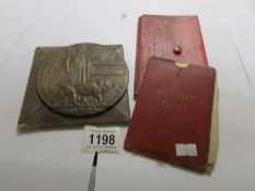 A WW1 death plaque and assorted documents including soldiers pensions 1917, character certificate,