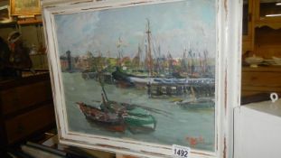 A 20th century European impressionist school oil on canvas laid on board of a harbour scene with