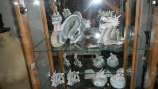 4 Ceramic dragons and 2 pots with dragons on lids.