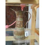An Islamic copper jug, early 19th century Ottoman,