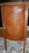 A Satin wood pot cupboard.