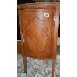 A Satin wood pot cupboard.