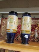 A pair of Royal Doulton vases, 16" tall.