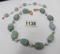 An Adventurine/pearl necklace from British Museum Classical Pieces.
