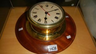 A brass ship's clock.