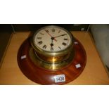 A brass ship's clock.