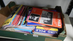 A box of King Pole magazines.
