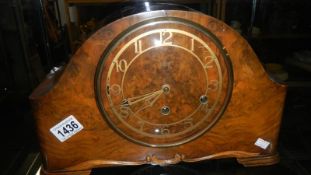 A mantel clock.