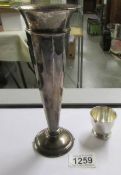 A silver egg cup (hall marked for F H Adams & Holman,