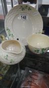 3 items of Beleek porcelain including milk jug, cup and side plate.