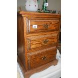 A good quality oak 3 drawer chest.