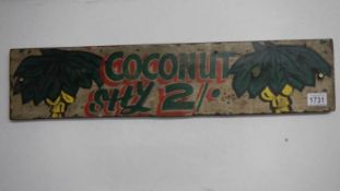 A Coconut shy fairground game sign