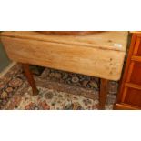 A pine drop leaf table.