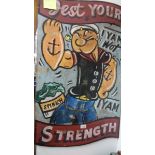A Popeye 'Test Your Strength' sign.