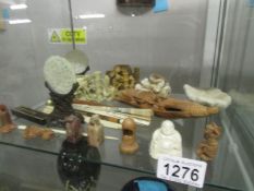 An interesting collection of Chinese jade, soapstone and wooden items.