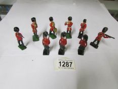 A quantity of loose Britain's guardsman figures.