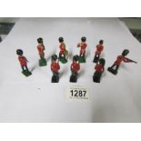 A quantity of loose Britain's guardsman figures.