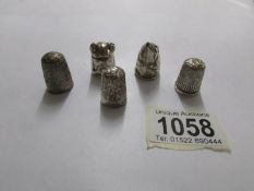 5 silver thimbles including fine mouse and frog examples.
