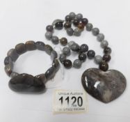 A Lola Rose grey agate heart necklace and bracelet.