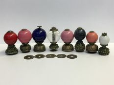 8 Chinese glass and gilt metal mounted hat finials.