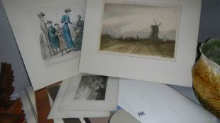 A portfolio of prints, watercolours, artist signed prints etc., including prints after J.W.M Turner.