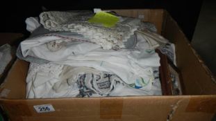 A large box of assorted linen.