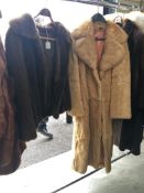 2 fur jackets,