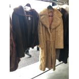 2 fur jackets,