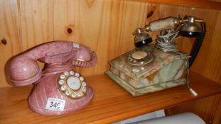 2 vintage style telephones.