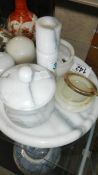 A marble tray and marble condiment pots etc.