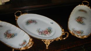 3 gilt mounted porcelain serving dishes.