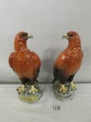 A pair of Beswick golden eagle decanters for Beneagles scotch whisky, modelled by J G Tongue, 1969.