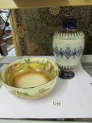 A Doulton Lambeth vase and a Royal Doulton bowl.