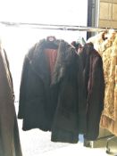 2 fur coats,
