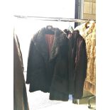 2 fur coats,