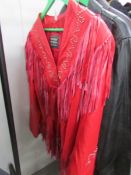 A red leather jacket by Attraction with stud and fringe detailing, no marked size.