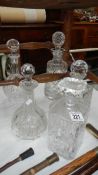 5 glass decanters.