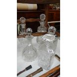 5 glass decanters.