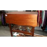 A drop leaf tea trolley.