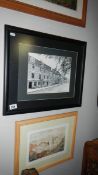 A framed and glazed watercolour village scene with church and a black framed and glazed mews scene