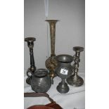 A brass vase, 2 metal candlesticks,, a metal pot and a metal goblet.