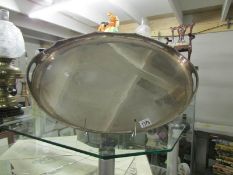 A large silver plate gallery tray.