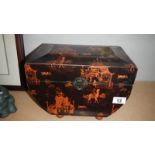 An oriental lacquered casket.