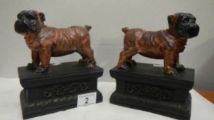 A pair of dog book ends.