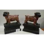 A pair of dog book ends.