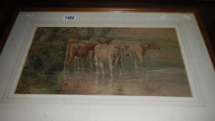 A watercolour 'Cattle in a pond' signed H Richardson.